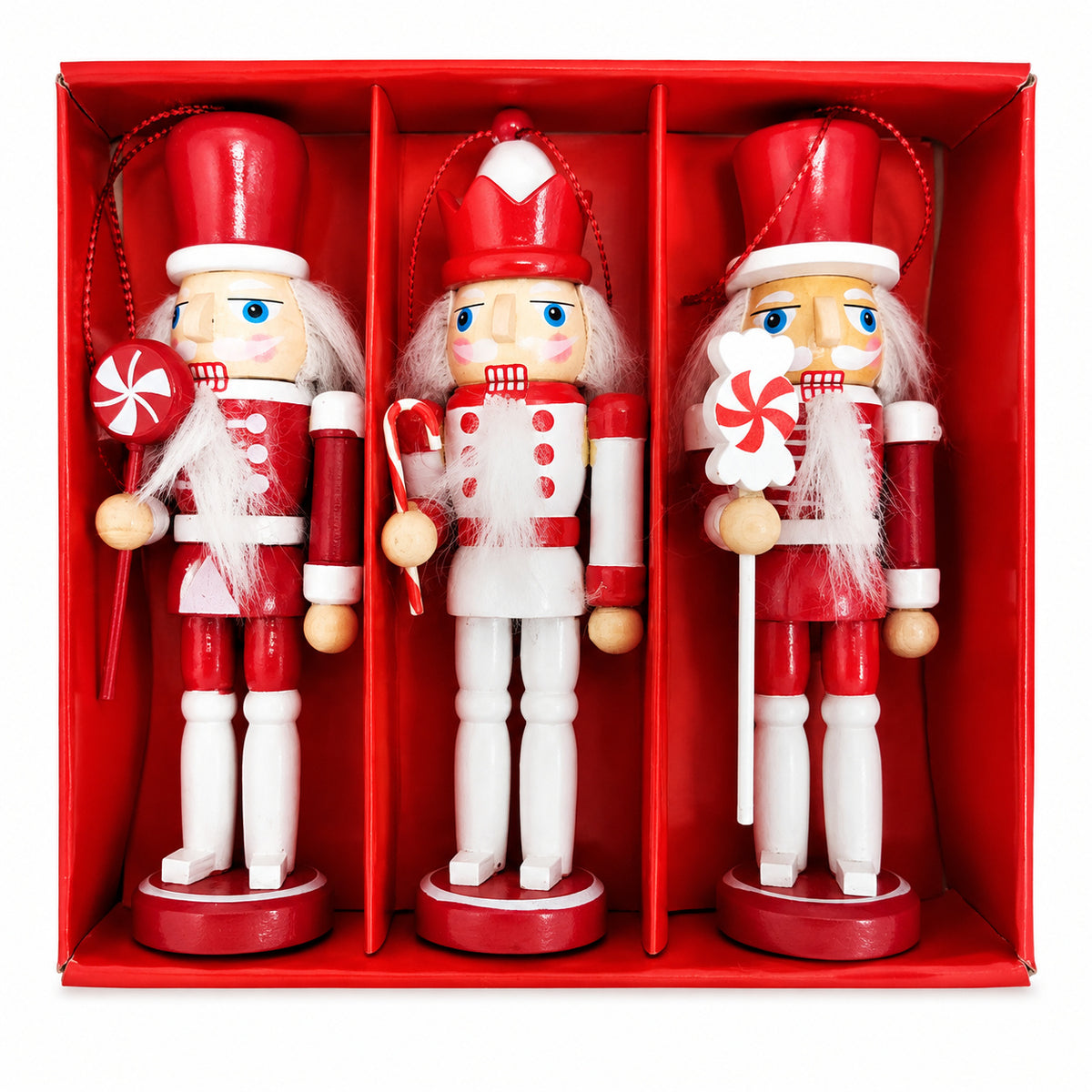 Three red and white wooden nutcracker hanging decorations